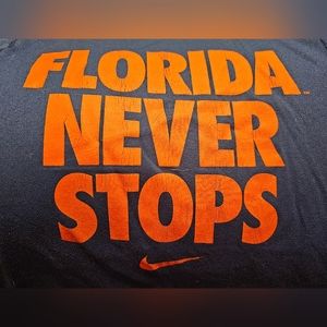 Florida Gators - Florida Never Stops kids Nike Dri-fit T-shirt.  Size:S